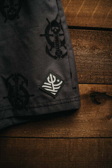 Nine Line Anchor Skull workout Shorts in charcoal feature a black skull with a nautical theme